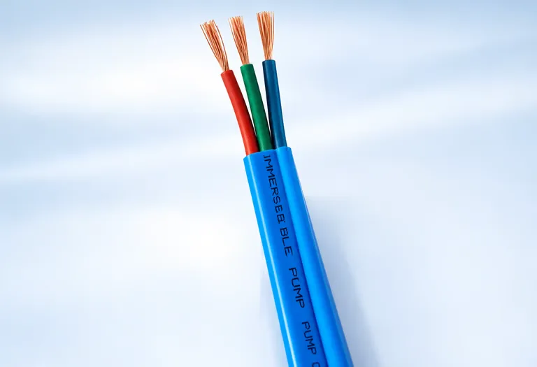 Flat submersible pump cable with exposed stranded copper conductors in red, green and blue insulation
